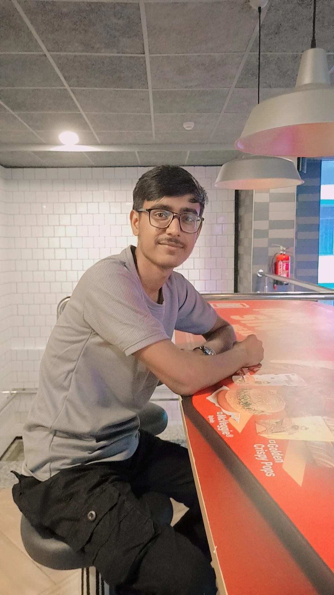 Altamas - Professional headshot of a BCA student and web developer specializing in JavaScript, Python, and AI exploration